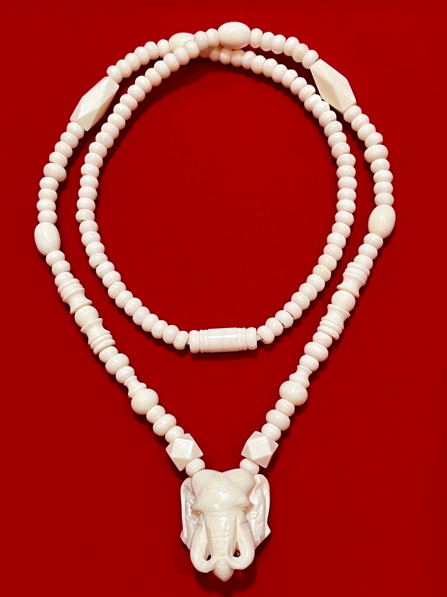Carved White Elephant Necklace