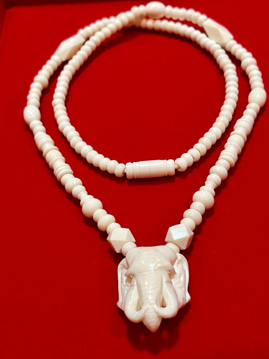 Carved White Elephant Necklace